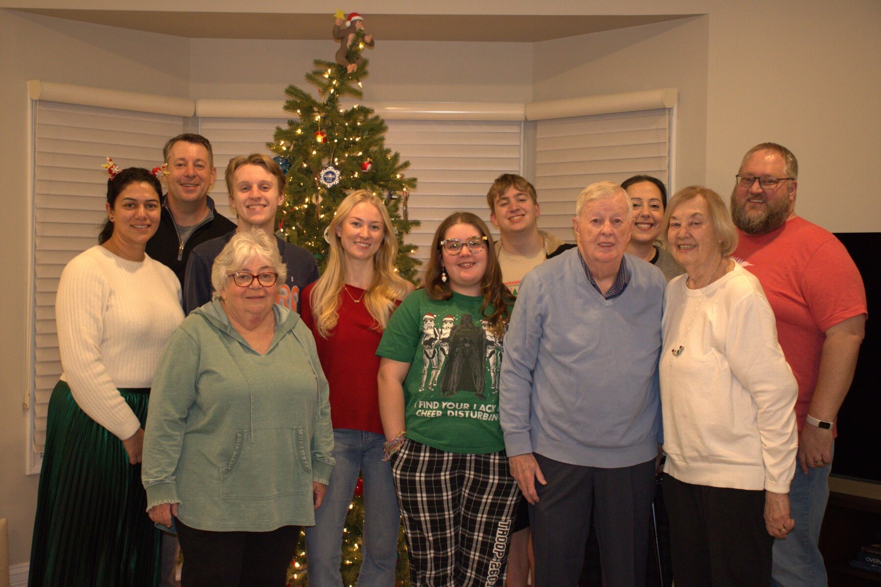 Tom and Ann Snyder surrounded by family at Christmas 2025