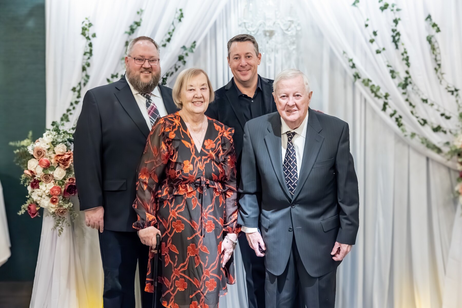 Tom and Ann Snyder with family at a wedding