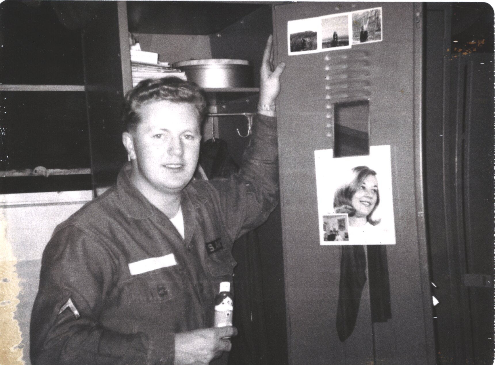 Young Tom Snyder beside a locker during his Army service
